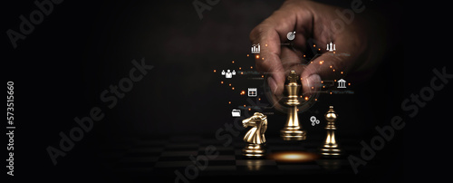 Hand choose king chess fight concept of challenge or team player or business team and leadership strategy or strategic planning and human resources organization risk management. photo
