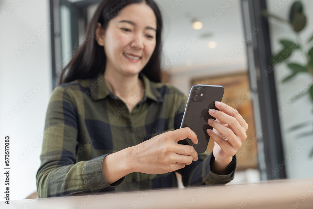 woman using cell phone hand holding mobile texting message contact us.chatting,search internet information.technology device communication connecting woman using cell phone hand holding mobile texting message contact us.chatting,search internet information.technology device communication connecting
