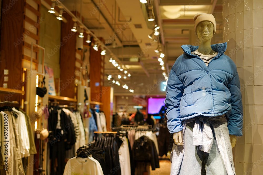 Fashion concept. Photo of stylish female mannequin demonstrating clothes in the store