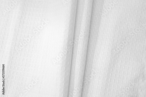 White textured cotton fabrics swatches on light background. Layered Textile Mockup