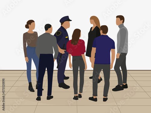 Policeman and a group of men and women together indoors