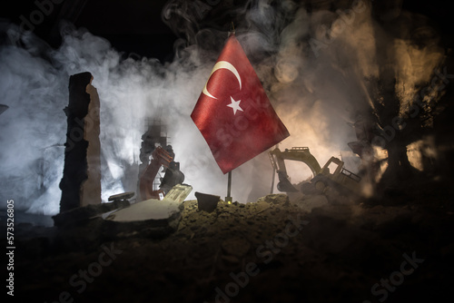 Turkey flag on the cracked earth. National flag of Turkey. Earthquake or drought concept