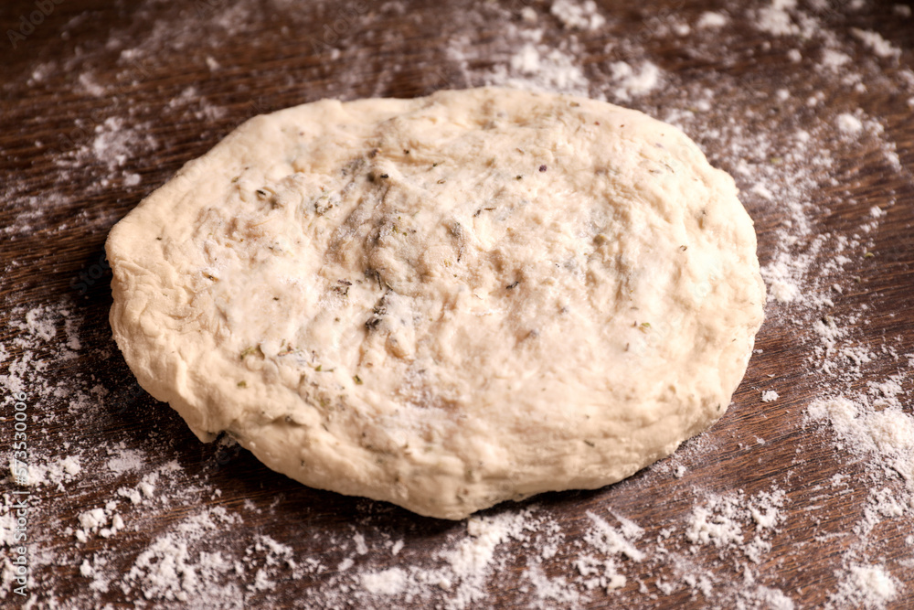 Fresh dough on wooden table, closeup. Cooking grissini Fresh dough on wooden table, closeup. Cooking grissini
