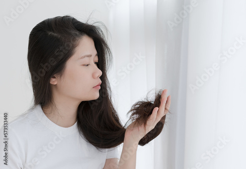  woman holding her hair