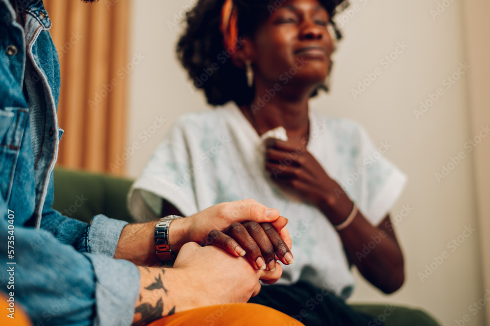 Diverse couple on a therapy session in a psychologist office Diverse couple on a therapy session in a psychologist office