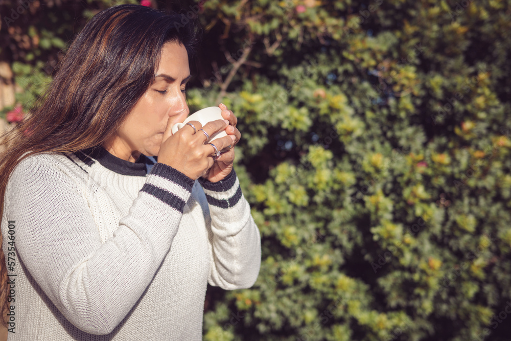 Break to Enjoy, Latina Woman Enjoying the Garden with Coffee