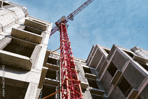 Tableau sur toile View from the bottom of the construction of a new residential building