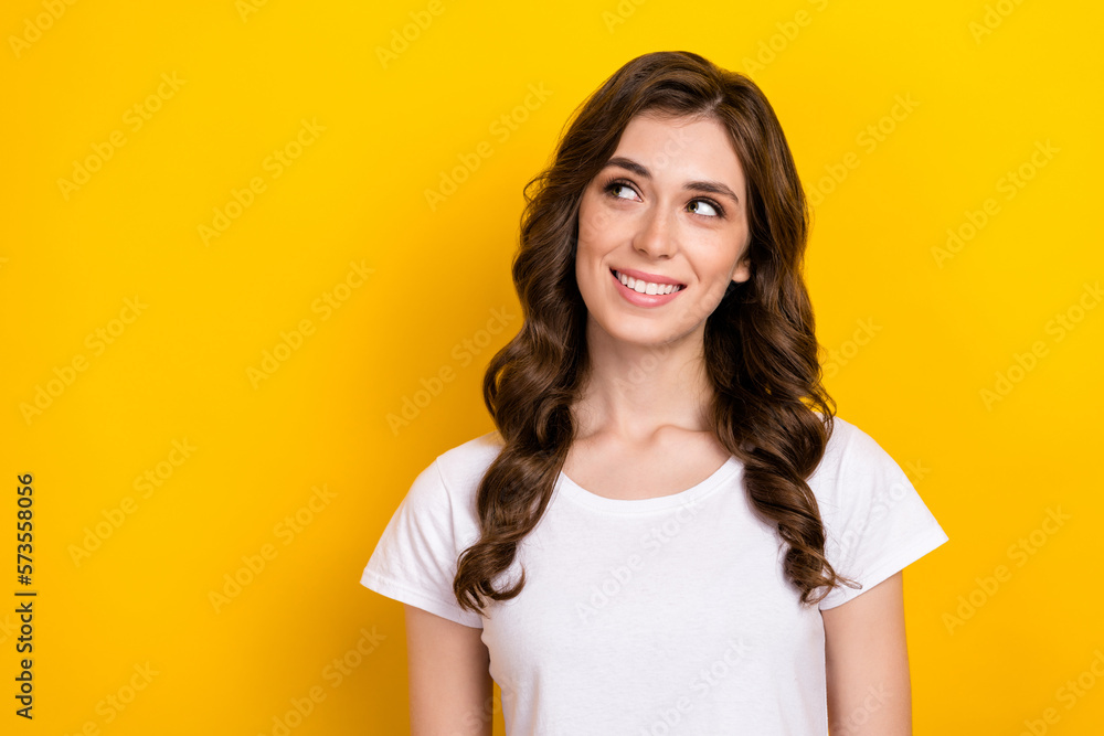 Portrait of adorable pretty young business woman smiling looking mockup opening new accessories store ad isolated on yellow color background Portrait of adorable pretty young business woman smiling looking mockup opening new accessories store ad isolated on yellow color background