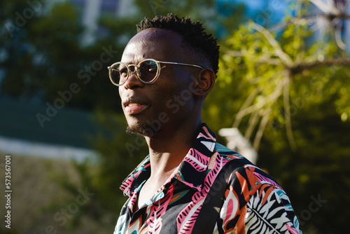 keep positive thoughts in your mind all the time, thoughtful african young man standing outdoors.