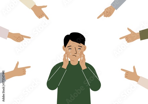The concept of public condemnation, victim blaming and bullying. Crying depressed boy. The fingers point at the character and hate him. Internet cyberbullying.