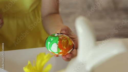 Wallpaper Mural the girl's hands decorate eggs for the Easter holiday, at the table in the room. Torontodigital.ca