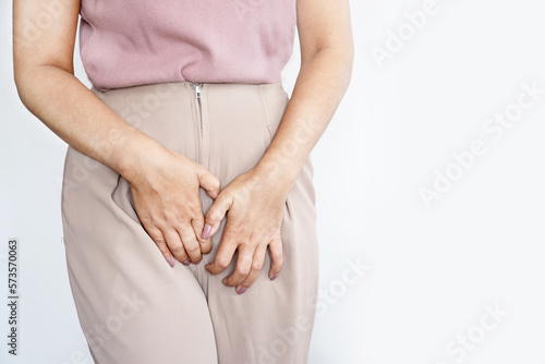 vaginal yeast infection concept woman suffering from itching and irritation in the vagina and vulva photo