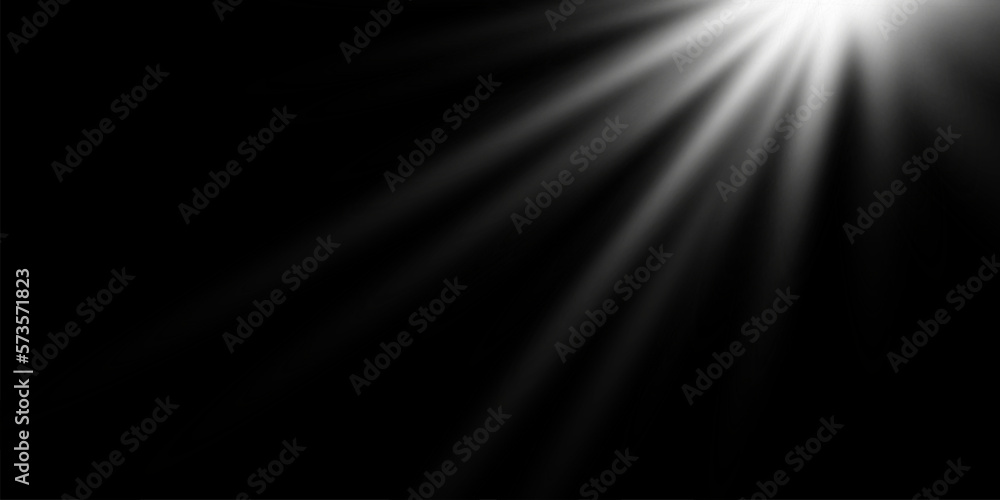 Bright white rays of light and sun, spotlights, lighting on a black background Bright white rays of light and sun, spotlights, lighting on a black background