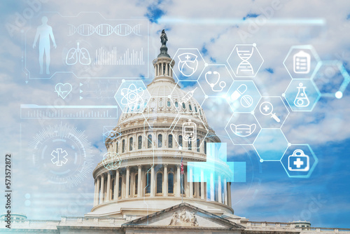 Capitol dome building exterior, Washington DC, USA. Home of Congress and Capitol Hill. American political system. Health care digital medicine hologram. The concept of treatment and disease prevention