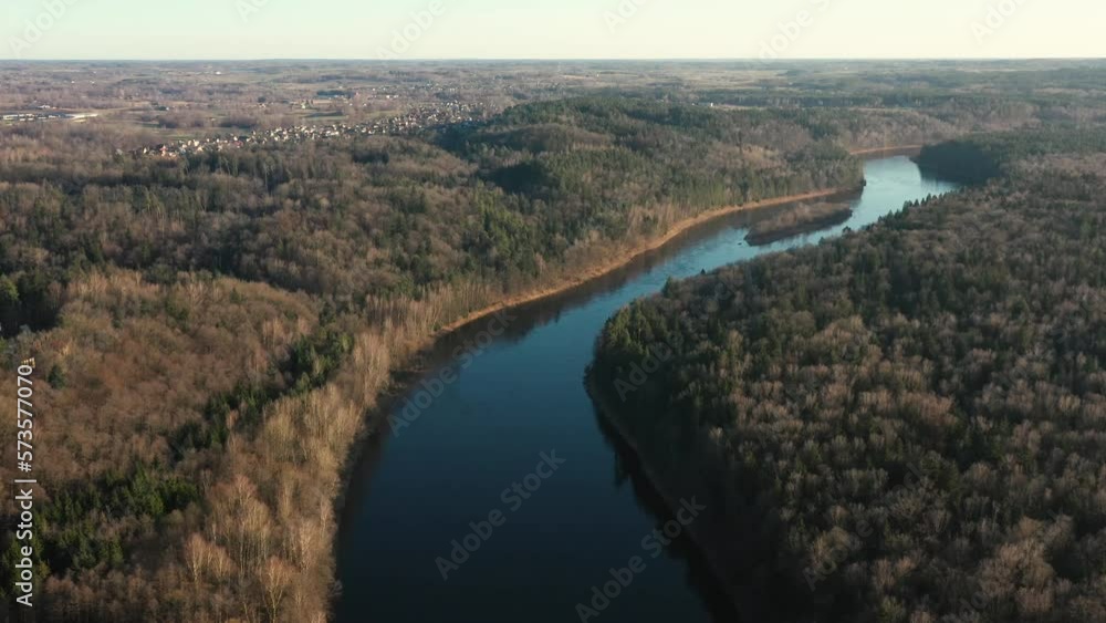 Flying over wild river on sunset Flying over wild river on sunset