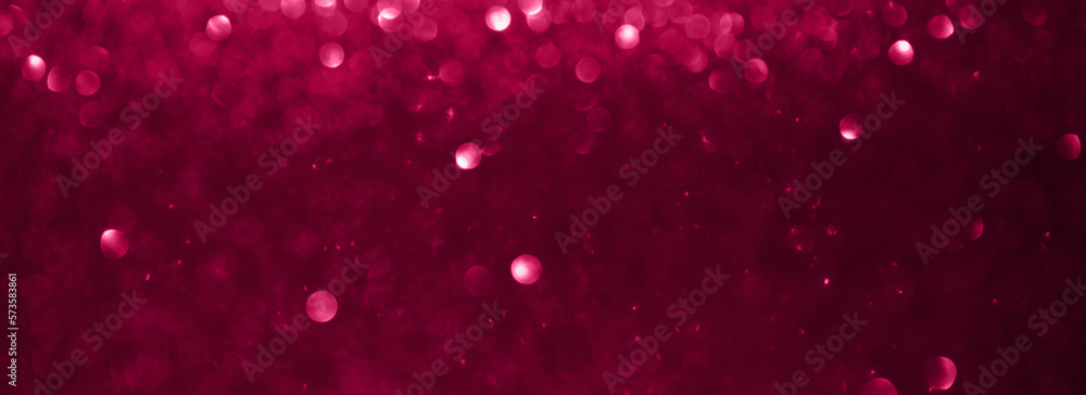Viva magenta shiny blurred background for holiday design. Web banner abstract sparkles, selective focus Viva magenta shiny blurred background for holiday design. Web banner abstract sparkles, selective focus