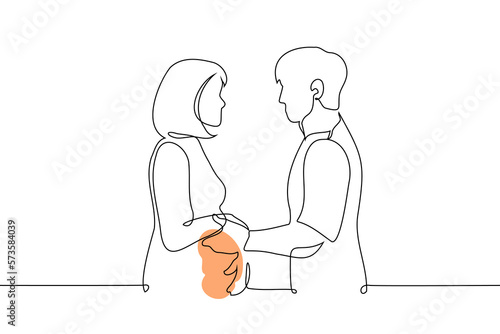 pregnant woman and man looking at each other holding hands - one line drawing vector. concept of a heterosexual couple expecting a baby, the relationship of future parents, support during pregnancy