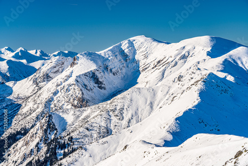 Fototapeta Naklejka Na Ścianę i Meble -  Poland 2022. Beautiful view on the snow Tatry. Zakopane, Giewont, Kasprowy Wierch, Swinica, Rysy, Kresanica.