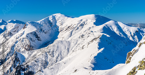 Fototapeta Naklejka Na Ścianę i Meble -  Poland 2022. Beautiful view on the snow Tatry. Zakopane, Giewont, Kasprowy Wierch, Swinica, Rysy, Kresanica.