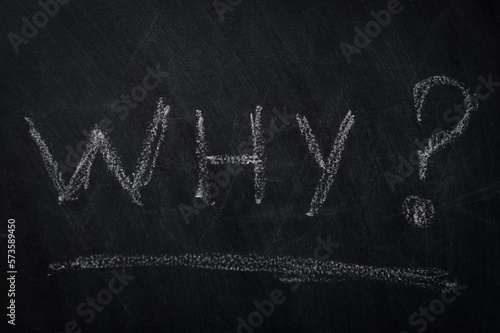 Why ? The word why written in chalk on a blackboard - one of the essential questions in journalism and communication