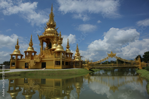 Golden  Temple - The Golden Hall of Ganesha near White Temple, Chiang Rai, Thailand © bayazed