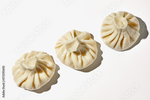 Cooked khinkali traditional georgian dish isolated on white background. Georgian traditional cuisine.