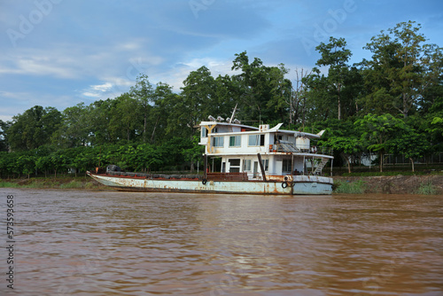 Mekong River tour boats, with Laos in the background in Ban Sop Ruak in the Golden Triangle, Chiang Rai Province, Thailand 