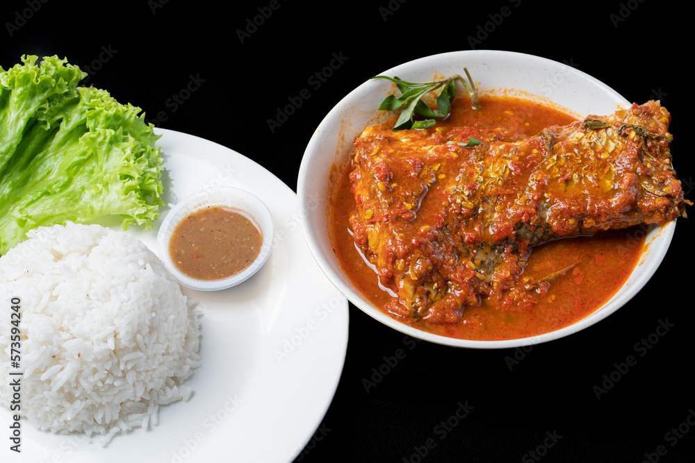 Asam Pedas Ikan translated as Spicy Sour Fish. Polular in Malaysia especially Malacca. Served on rice.