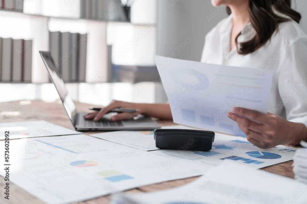 Hard working of asian people bookkeepers working with balance sheet and taxation, company quarterly reports of accounting and marketing. Hard working of asian people bookkeepers working with balance sheet and taxation, company quarterly reports of accounting and marketing.