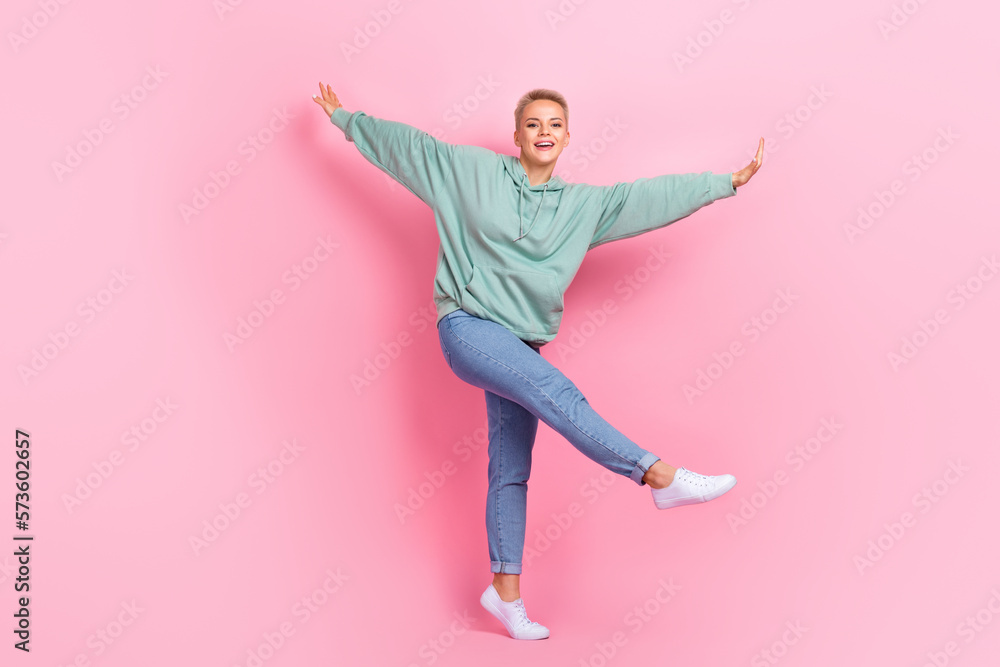 Full length photo of joyful happy lady wear trendy khaki clothes rejoice party holiday event isolated on pink color background