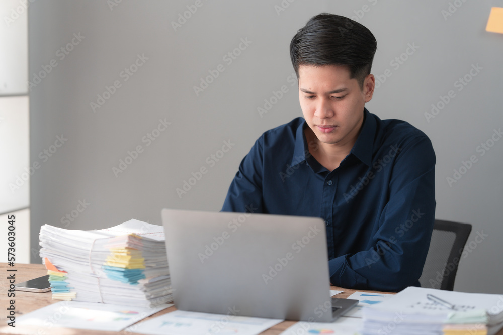 Hard working of asian people bookkeepers working with balance sheet and taxation, company quarterly reports of accounting and marketing. Using laptop computer Hard working of asian people bookkeepers working with balance sheet and taxation, company quarterly reports of accounting and marketing. Using laptop computer