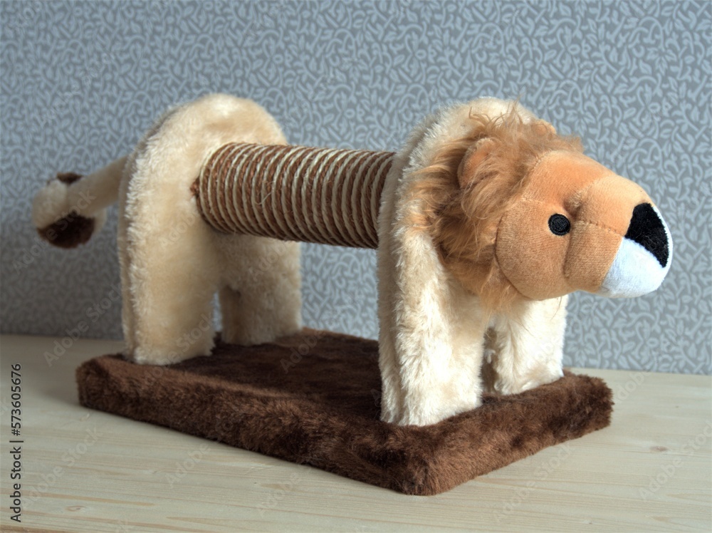 Cats claw sharpener with sisal rope and fluffy fabric. Kitten