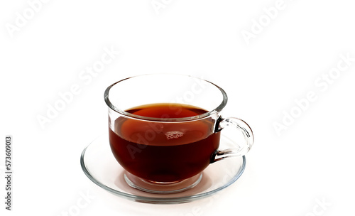Glass cup with black fragrant tea on a white background