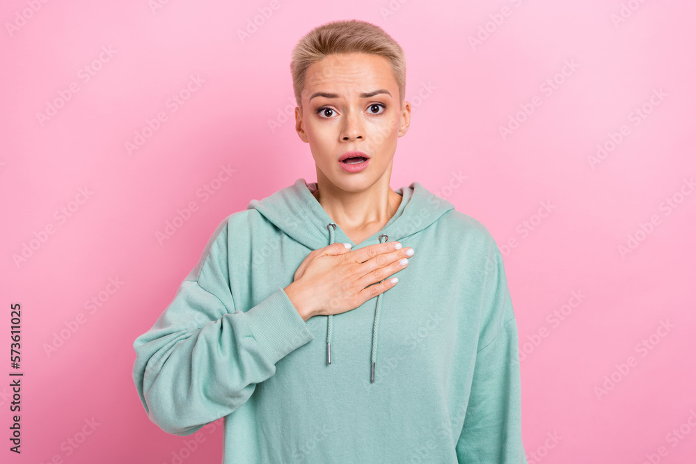 Photo portrait of pretty young girl palm touch chest astonished bad news wear trendy khaki garment isolated on pink color background Photo portrait of pretty young girl palm touch chest astonished bad news wear trendy khaki garment isolated on pink color background