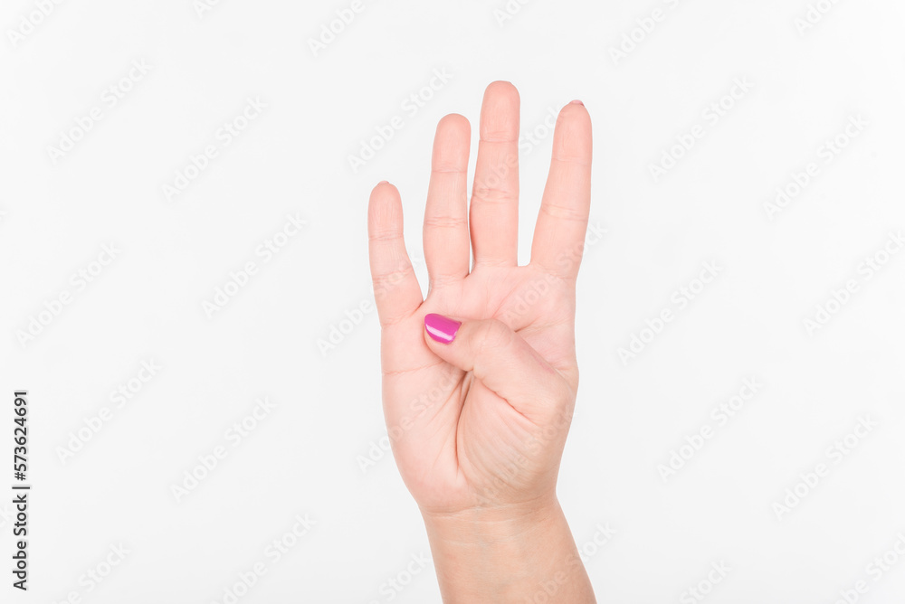 Woman Hand With Polish Nails Show Four Fingers. White Background. Woman Hand With Polish Nails Show Four Fingers. White Background.
