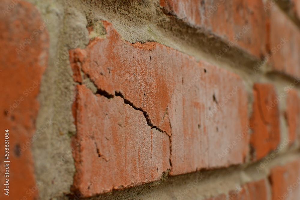 Background: refractories red bricks with crack