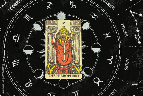 Bangkok, thailand, 14 Feb 23, tarot cards spreading flat lay, Raider wait tarot deck, major arcana, The Hierophant on the astrology zodiac horoscope constellation background.