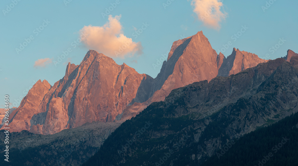 The Piz Badile, Pizzo Cengalo peaks in the Bregaglia range - Switzerland in evening light.