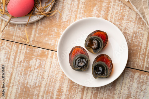 Принти на полотні Half sliced Century egg in white plate, Pink color preserved eggs