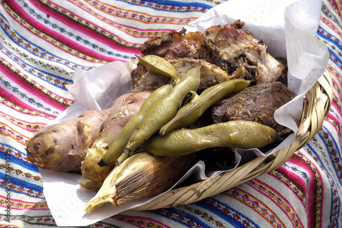 Pachamanca: traditional Peruvian food cooked underground and stones. A great variety of tubers and meats are cooked