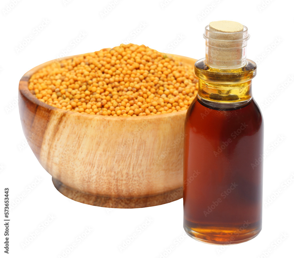 Fresh golden mustard on a wooden pot with oil