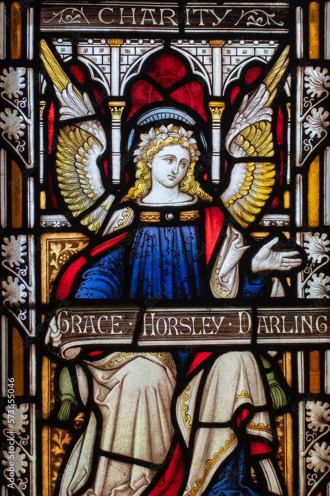 Grace Darling stained glass windows memorial. Inside St Aidan's Church in Bamburgh, Northumberland, UK
