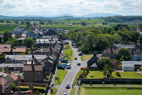Aerial views of Bamburgh village in Northumberland, UK, as seen from castle walls