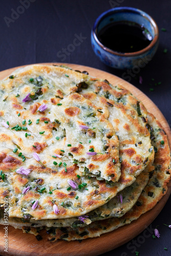 Obraz na płótnie Homemade appetizing scallion pancakes served with soy sauce. w salonie