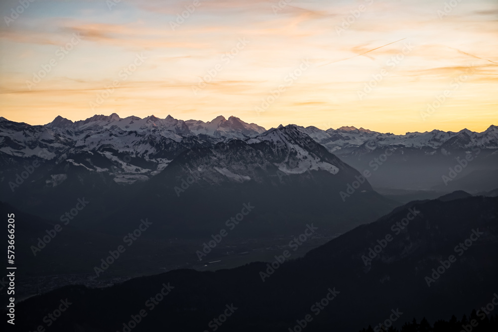Orange sunset on alpine mountains 