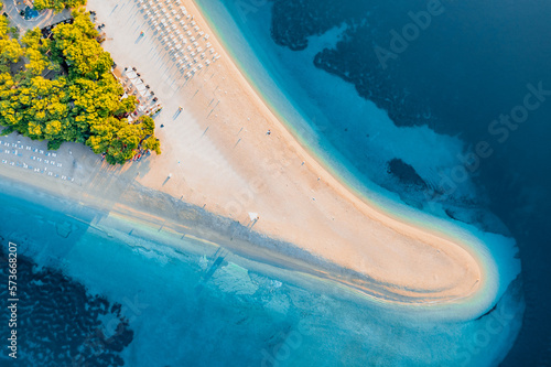 Panoramic aerial view at the Zlatni Rat. Beach and sea from air. Famous place in Croatia. Summer seascape from drone. Travel - image © VINSI