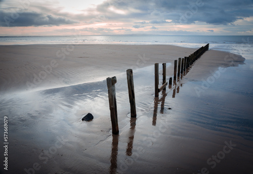 Sand clouds and groynes, Stevenston Beach, Saltcoats, North Ayrshire, Scotland,  UK