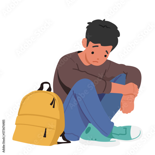 Sad Little Child Sitting On Floor With Head Down Conveying A Feeling Of Loneliness And Despair. Unhappy School Boy