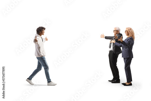 African american young man meeting caucasian man and woman