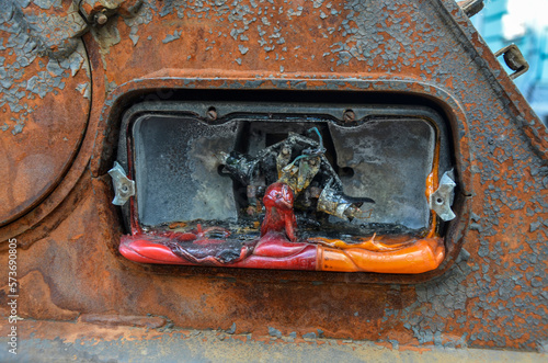 Rear light of the Russian BMP-82 (Infantry Fighting Vehicle). The plastic of the lantern melted from the temperature when the wrecked car burned from the inside.
